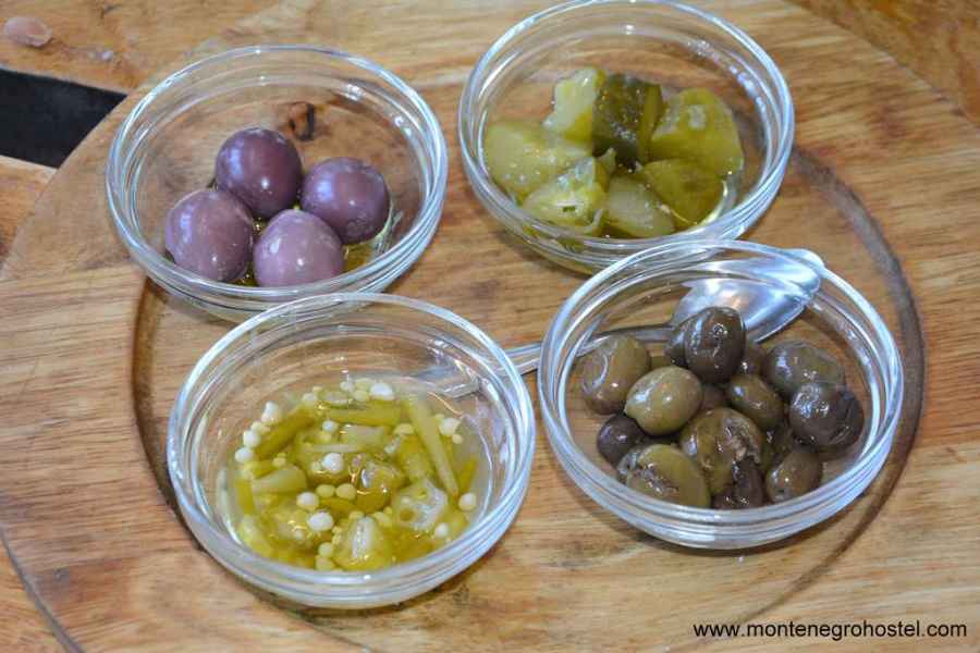 purple onion, green tomato, olives and pickled pepper